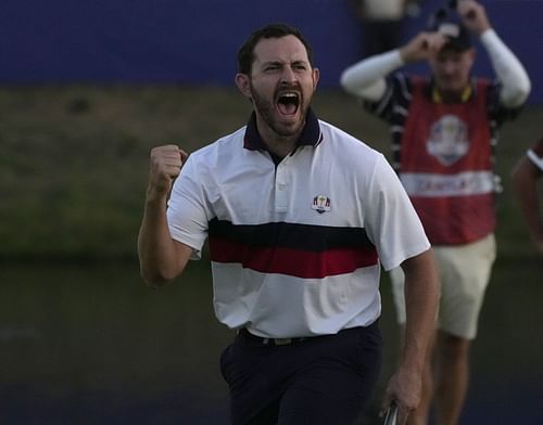 United States' Patrick Cantlay celebrates after holeing his putt on the 18th green to win the afternoon Fourballs match by 1 at the Ryder Cup (Image via AP Photo)