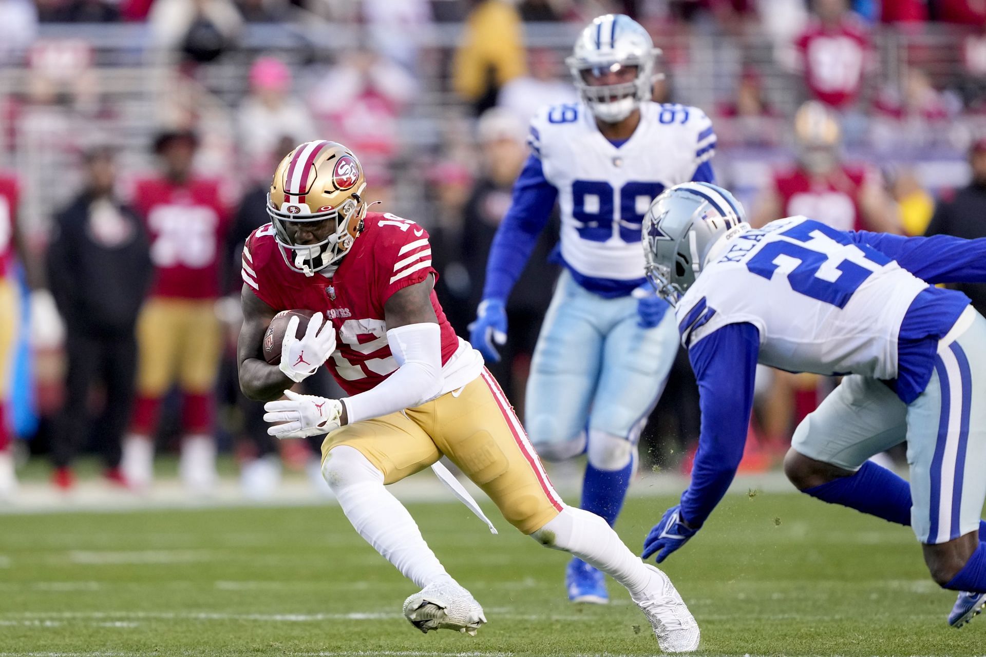 Deebo Samuel makes a reception during the NFC Divisional Playoffs - Dallas Cowboys v San Francisco 49ers