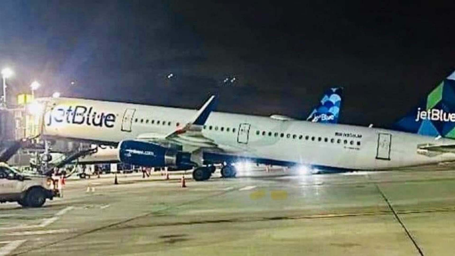 A JetBlue flight tipped backwards on Sunday (Image via Twitter/@jamiehanna2)