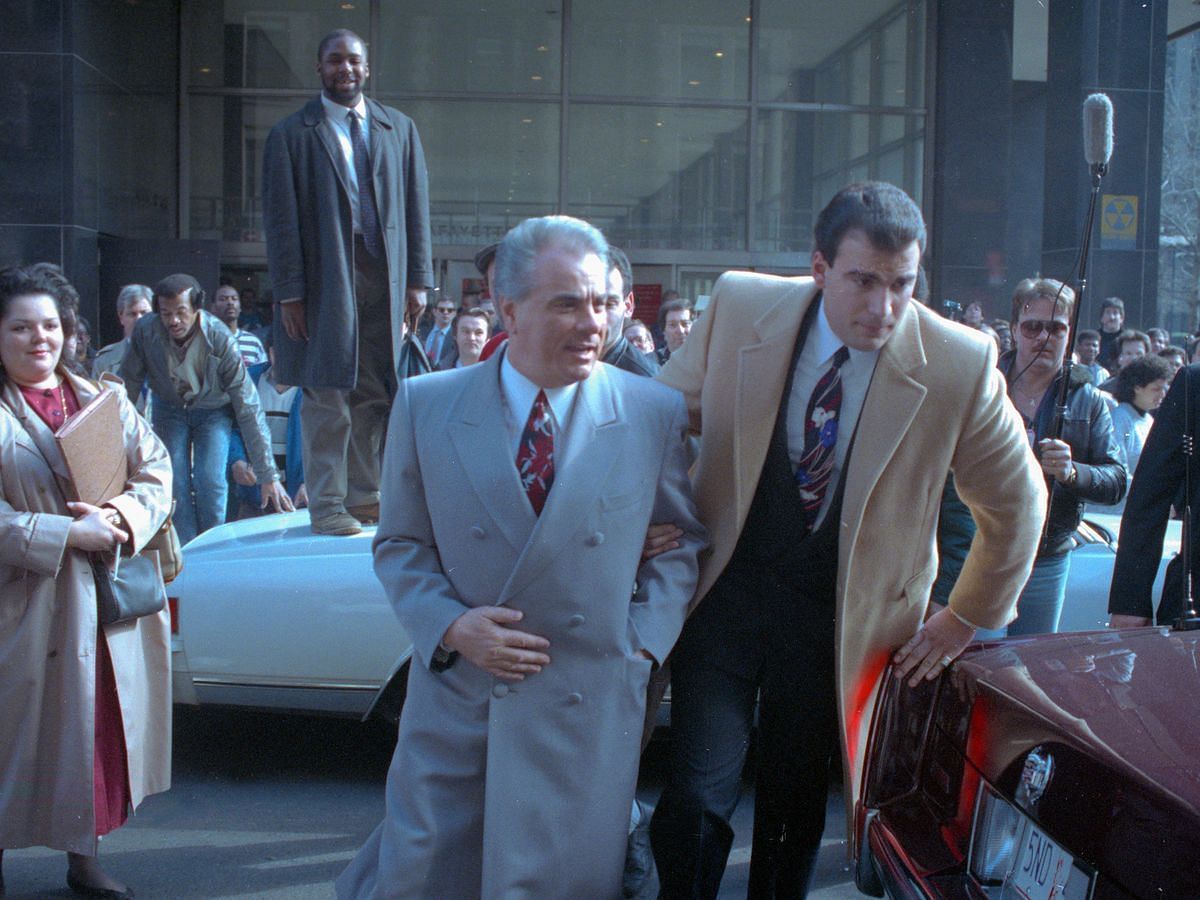 John Jospeh Gotti Jr. (center) in the streets of New York (image via biography.com)