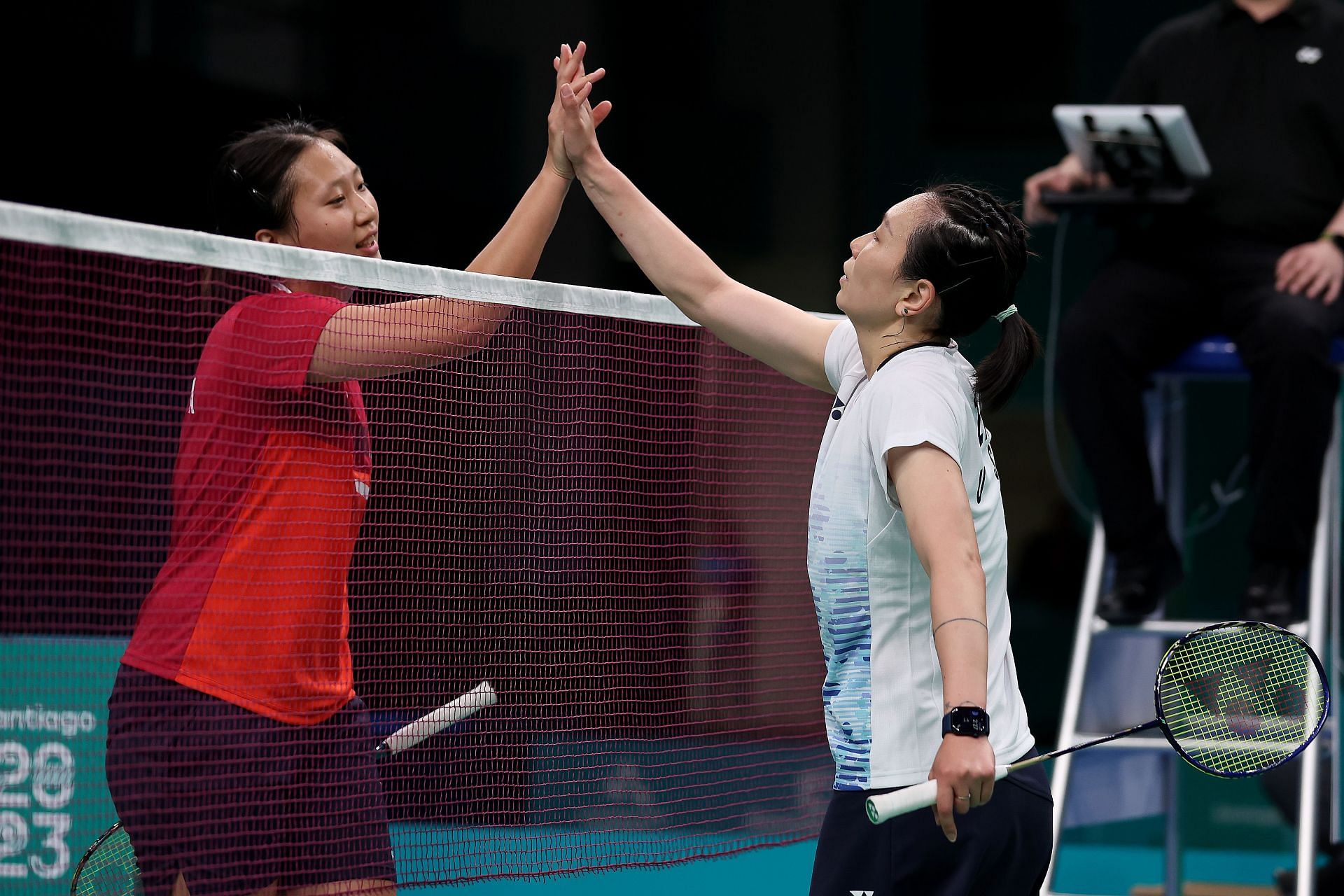 Jennie Gai greets Beiwen Zhang after the Badminton - Women&#039;s Singles Gold Medal Match at the 2023 Pan Am Games in Santiago, Chile.