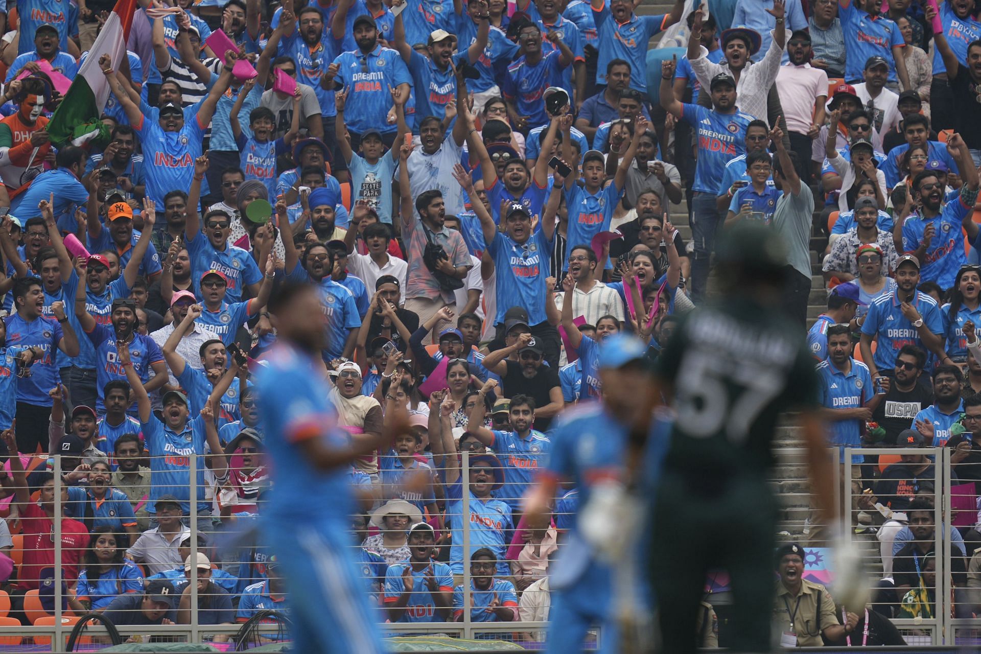 Indian fans cheer after a Pakistan wicket falls during the World Cup match. (Pic: AP)
