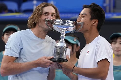 Max Purcell and Rinky Hijikata with the Japan Open trophy.