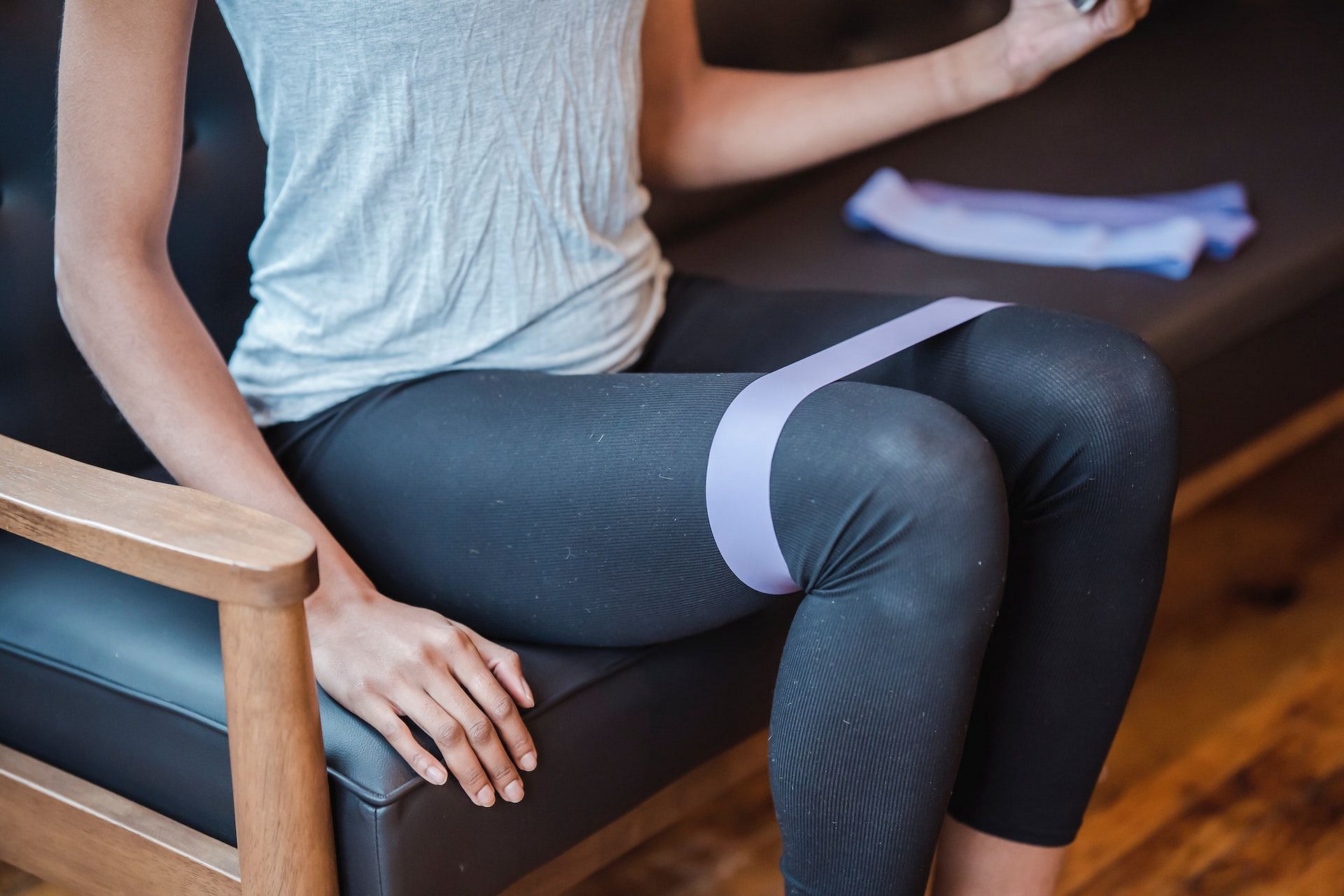 Seated piriformis stretch eases pain in the piriformis muscles. (Image via Pexels/Klaus Nielsen)