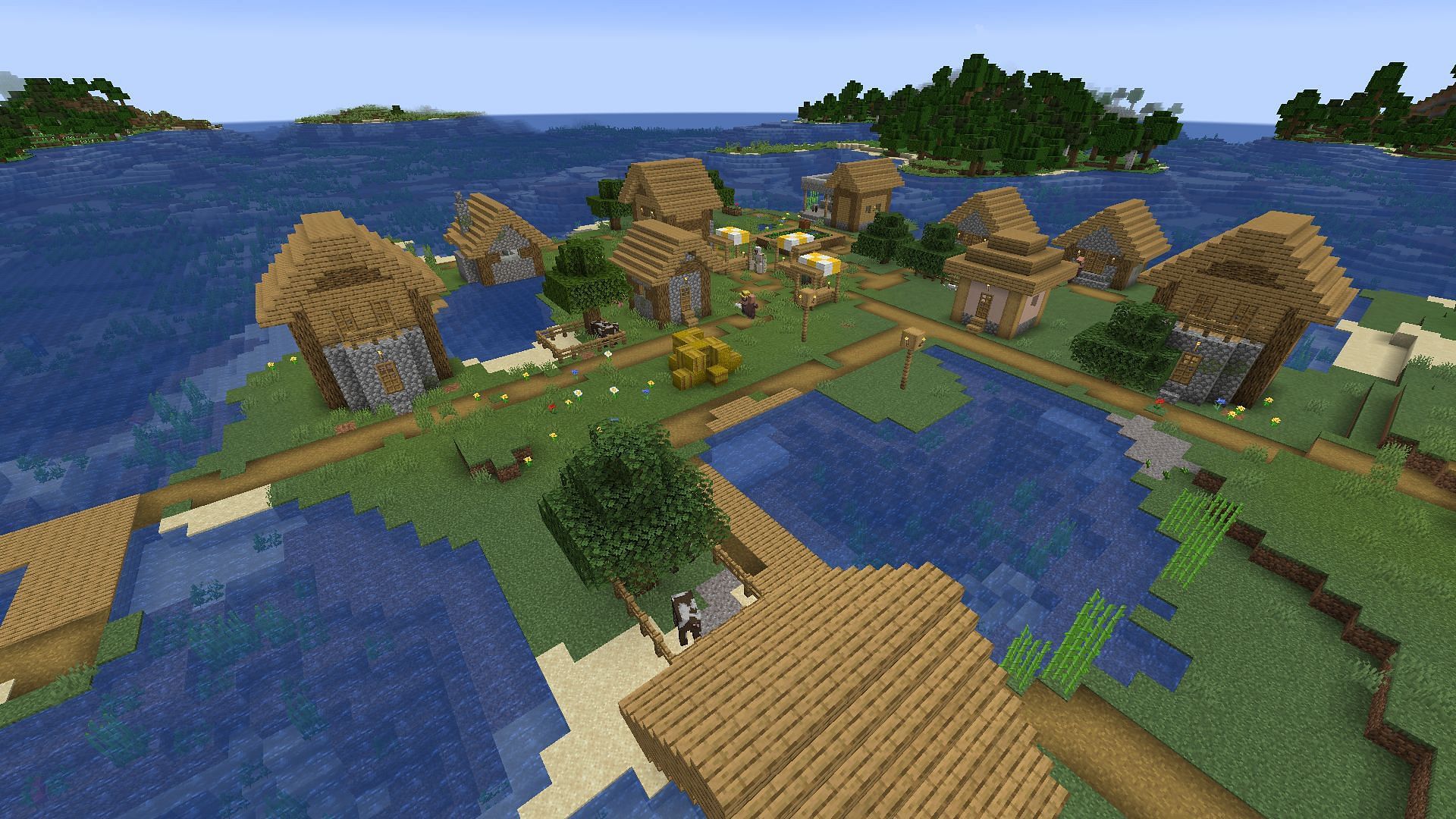 This Minecraft seed&#039;s spawn village has plenty of river nearby that presents interesting build opportunities (Image via Mojang)