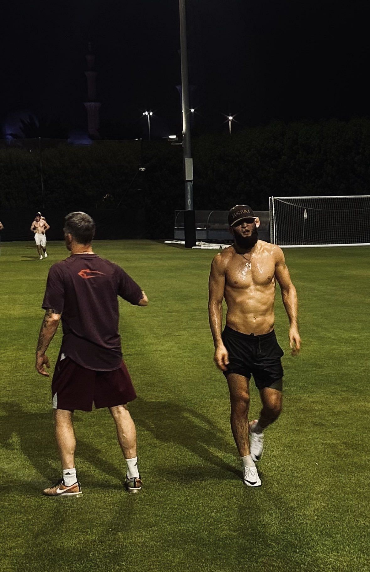 Khamzat Chimaev on a football field during fight week preparations