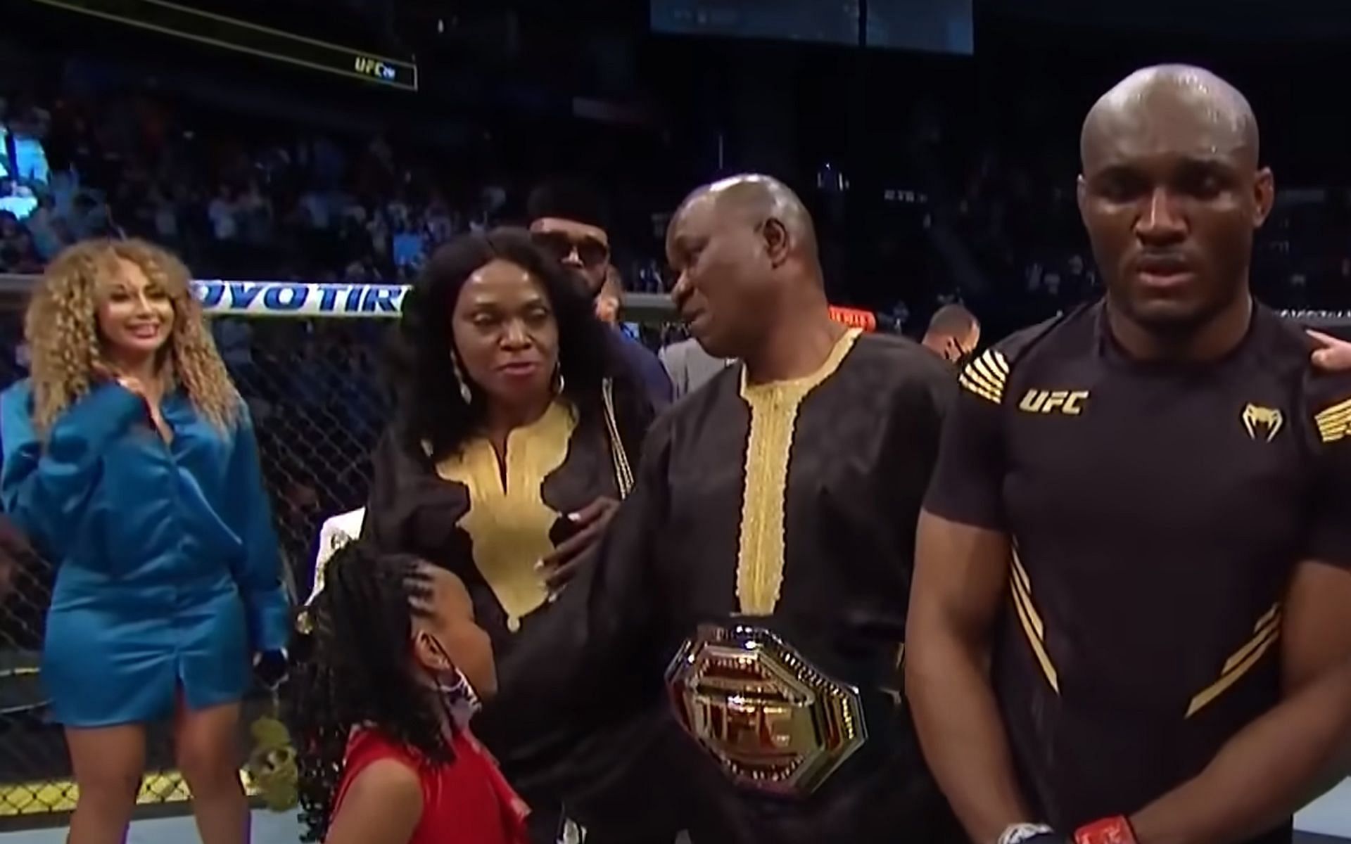Kamaru Usman (extreme right) and his wife Eleslie Dietzsch (extreme left) (Image via UFC official YouTube channel)