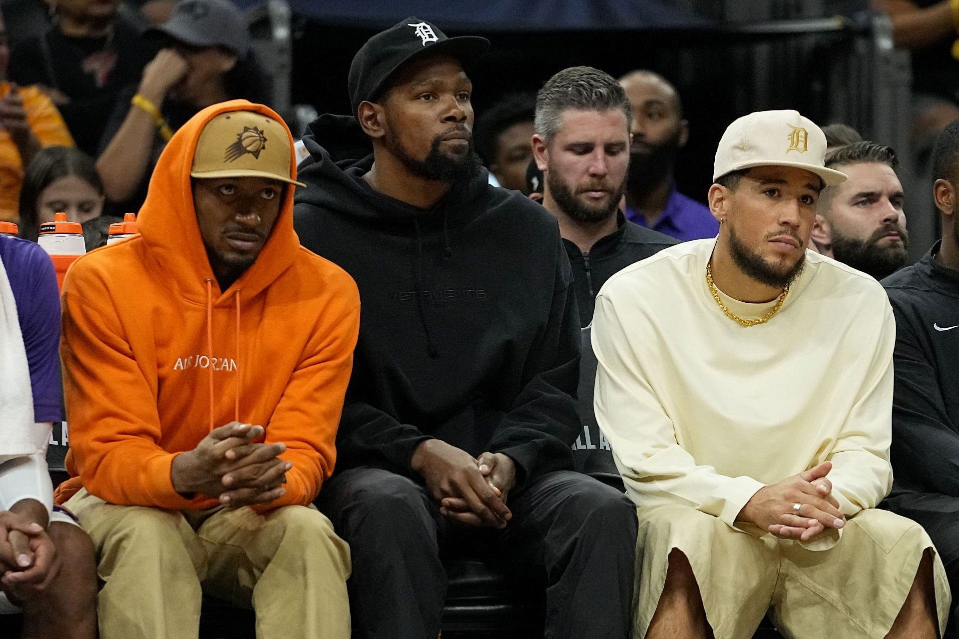 Suns&#039; Big 3 watching from the bench during a preseason game in Phoenix