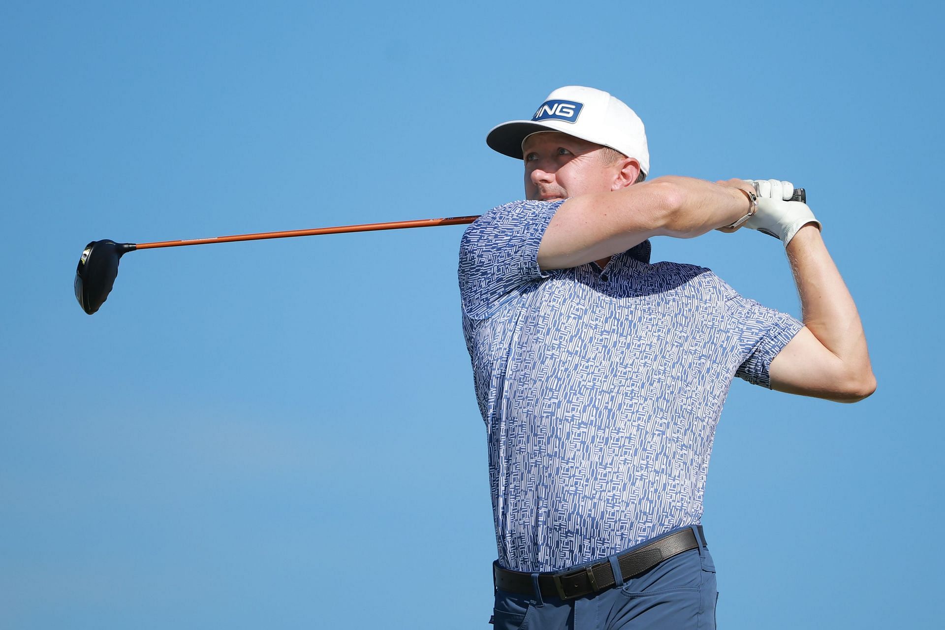 Mackenzie Hughes of Canada hits a tee shot 