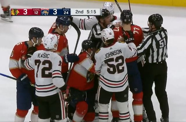 Watch: Dimitry Kulikov stormed by Blackhawks after hitting Connor Bedard