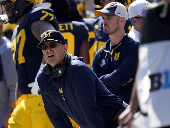 Jim Harbaugh's suspension takes an abrupt halt as CFB insider hints at potential retaliation from Michigan if Big Ten makes moves against head coach