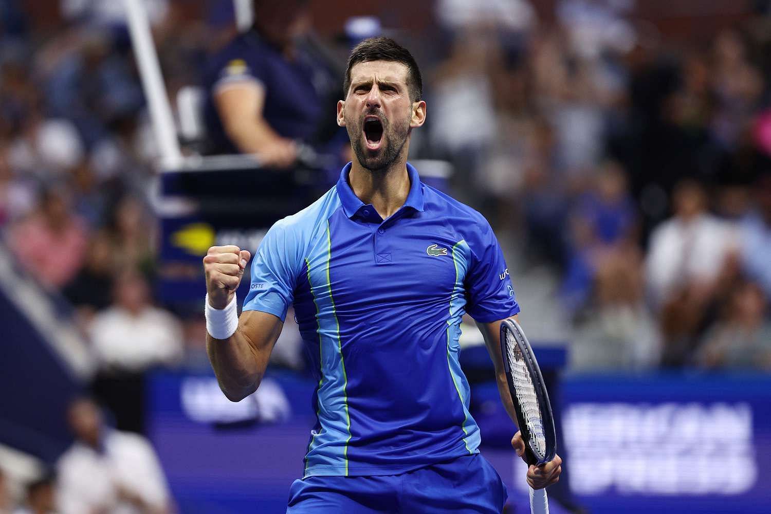 Novak Djokovic pumps his fist at the 2023 US Open