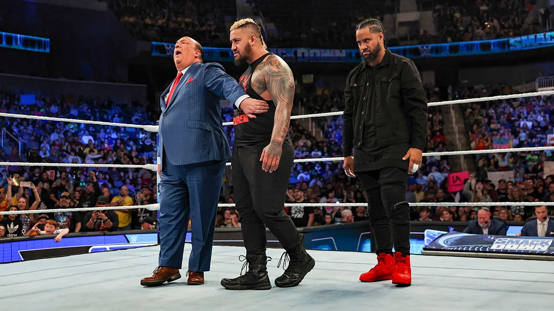 Paul Heyman with Solo Sikoa and Jimmy Uso on WWE SmackDown