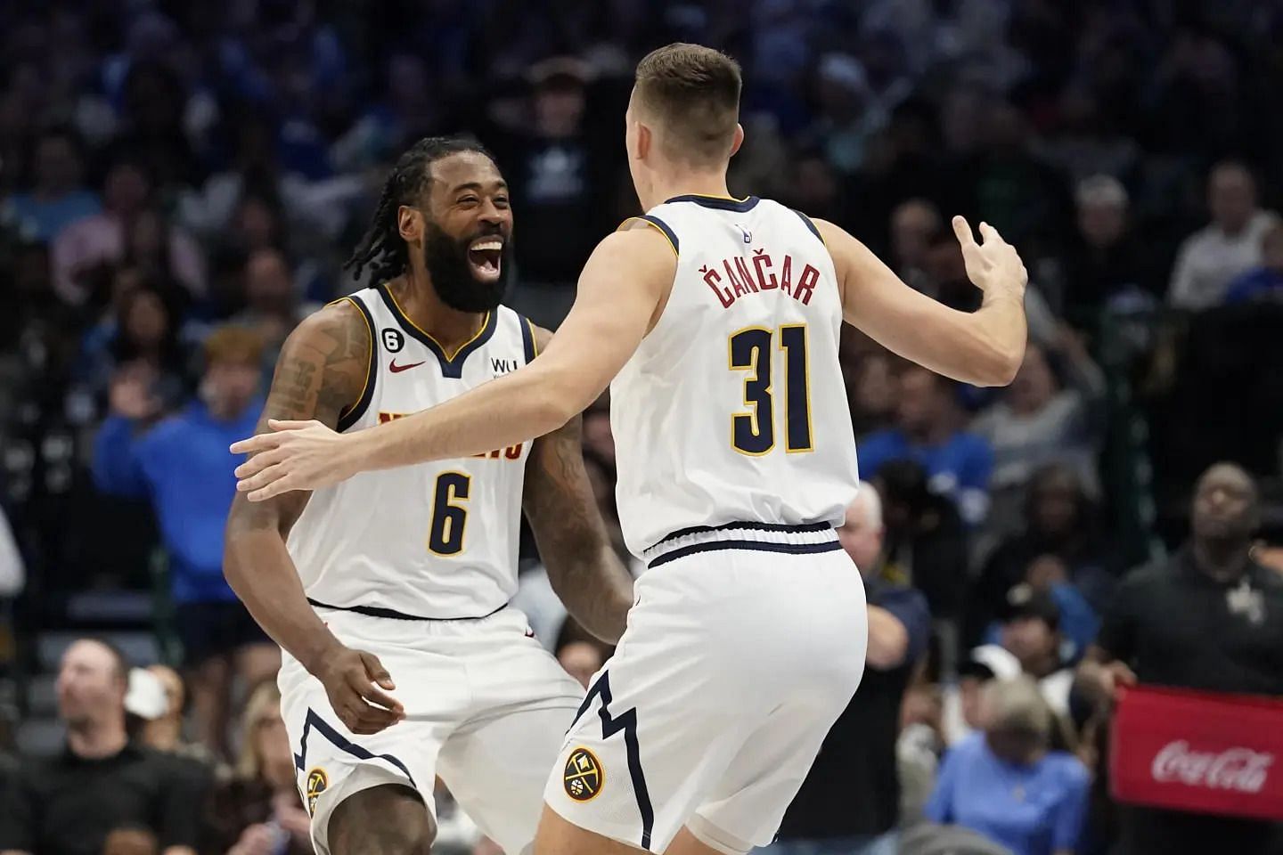 DeAndre Jordan (left) with Denver Nuggets teammate Vlatko Cancar (right) (AP Photo/LM Otero)