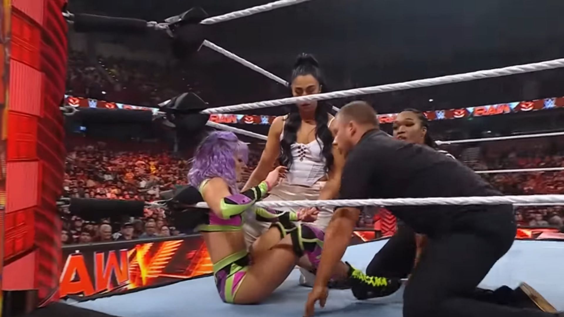 A WWE trainer checked on Candice LeRae after the match