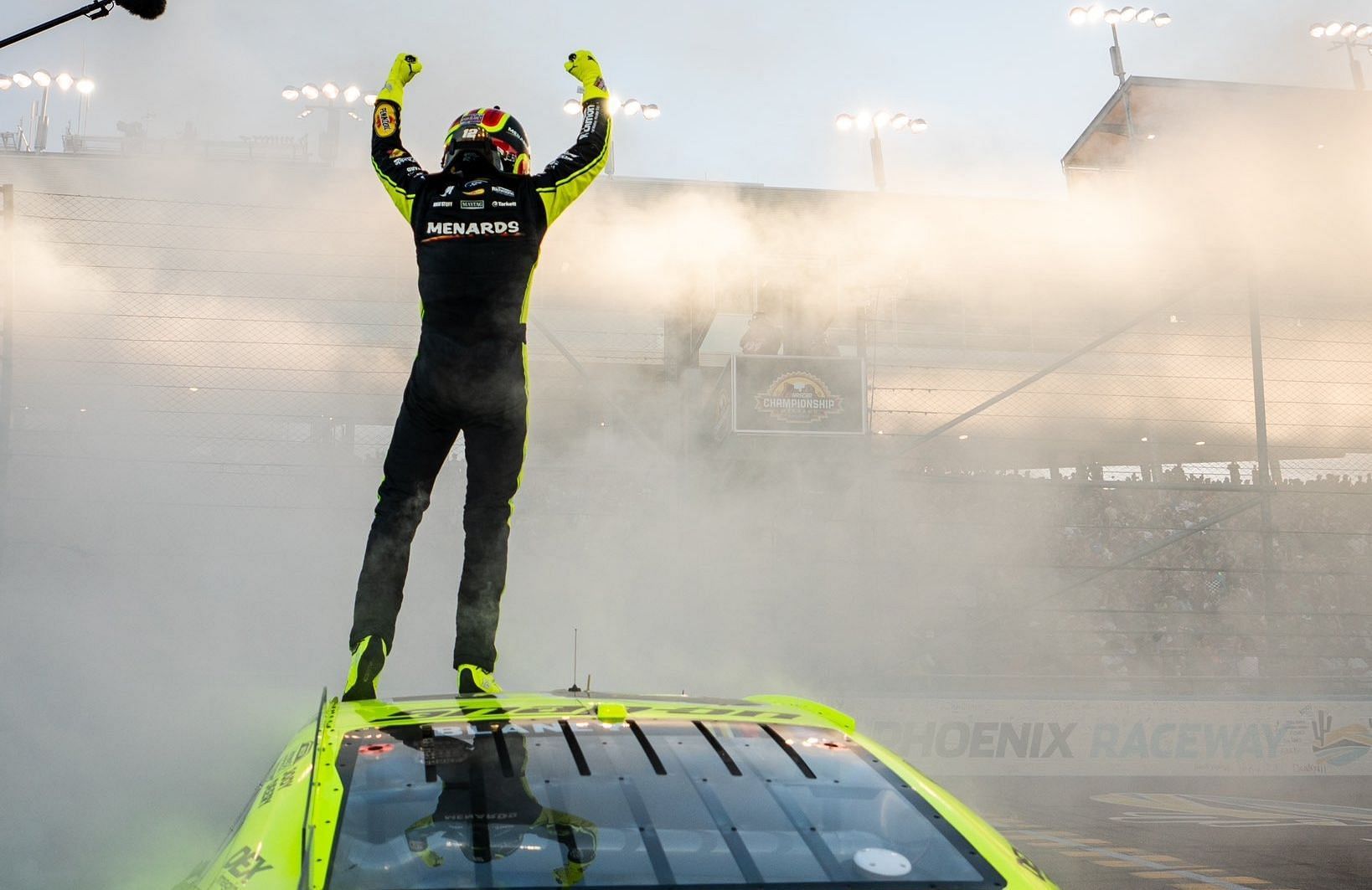 Ryan Blaney celebrates after winning the 2023 NASCAR Cup Series Championship 