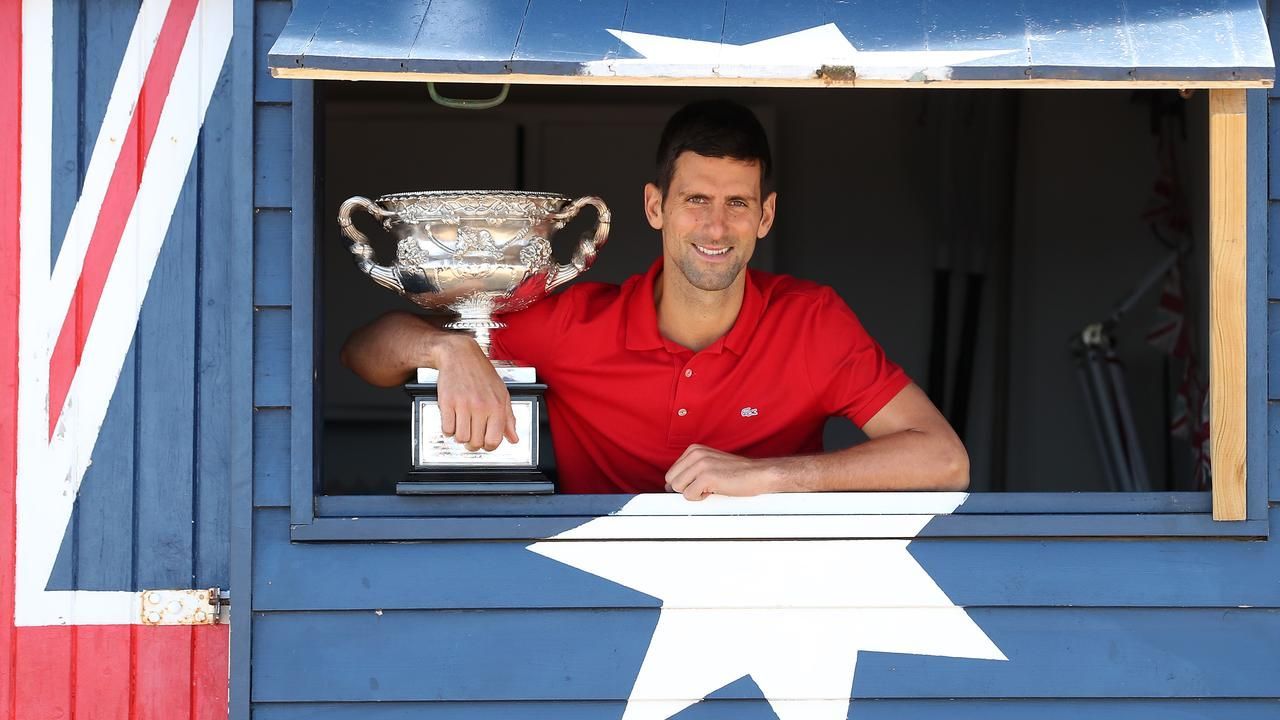 The Serbinator poses with the 2021 Australian Open trophy