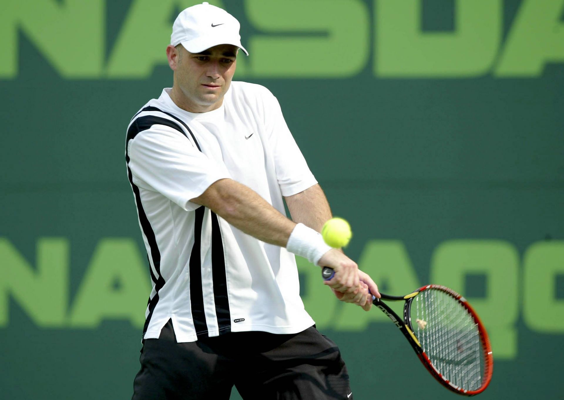 Andre Agassi in action against Michael Chang in 2003