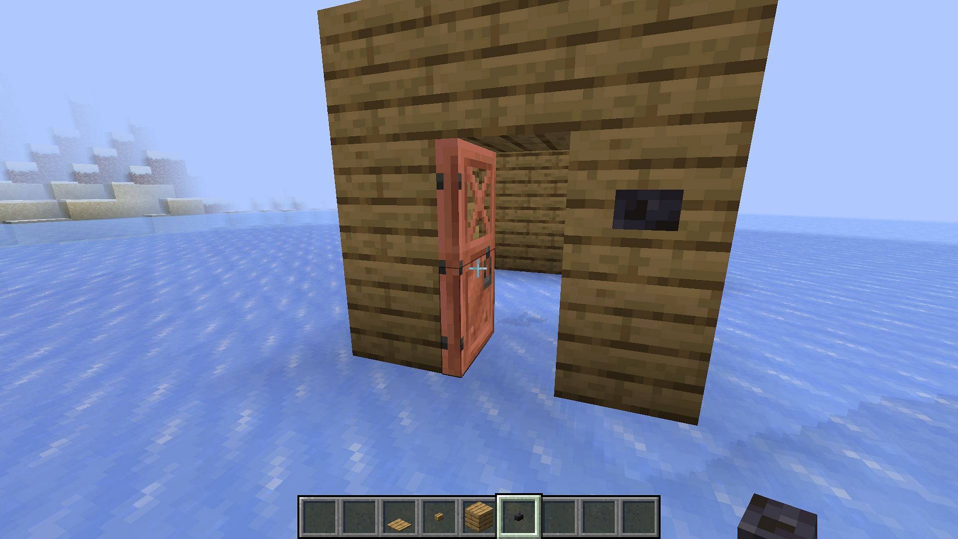 Copper doors, like any other door, can be opened and closed using hands or pushable blocks in Minecraft (Image via Mojang)
