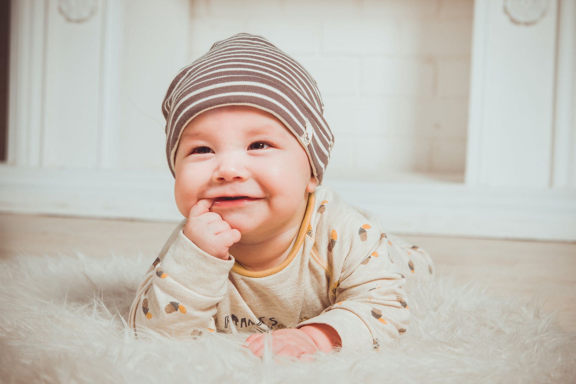 Teething and vomiting symptoms (image sourced via Pexels / Photo by Vika)
