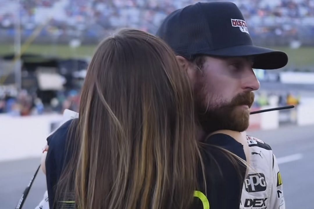 Ryan Blaney embraces his girlfriend Gianna Tulio after winning the NASCAR Cup Series race in Martinsville