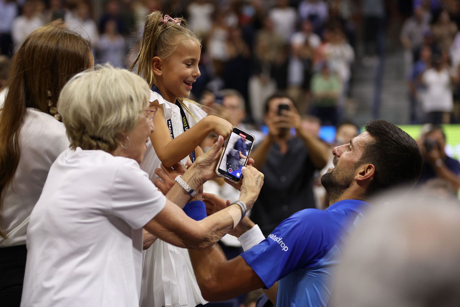 Novak Djokovic with his daughter at the 2023 US Open.