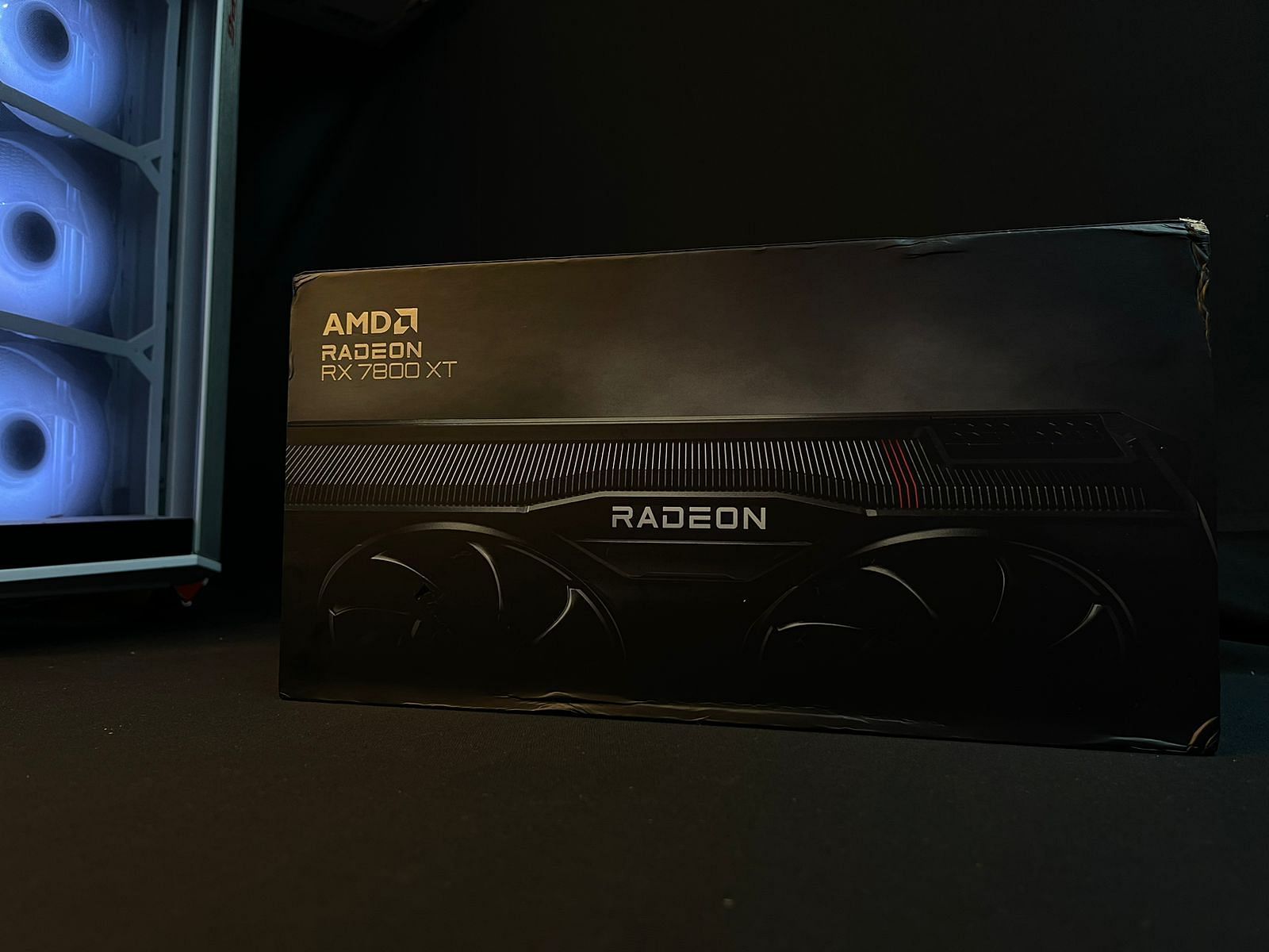 The retail packaging of the reference design AMD Radeon RX 7800 XT (Image via Sportskeeda)