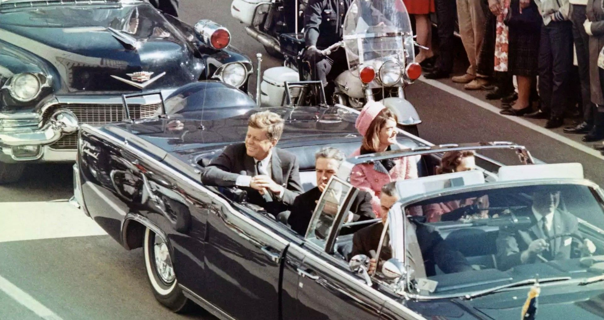 President Kennedy during a motorcade (Image via People)