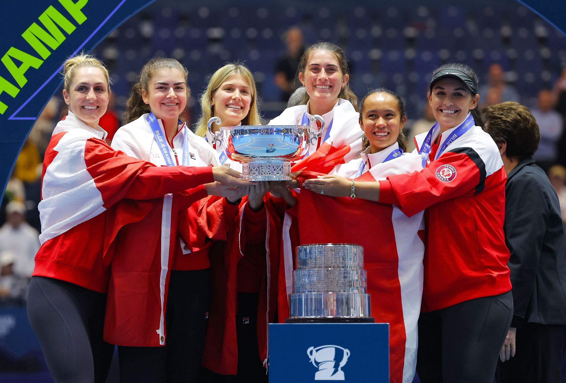 Eugenie Bouchard and the Canadian team with the Billie Jean King Cup trophy.