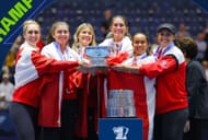 Eugenie Bouchard and the Canadian team with the Billie Jean King Cup trophy.
