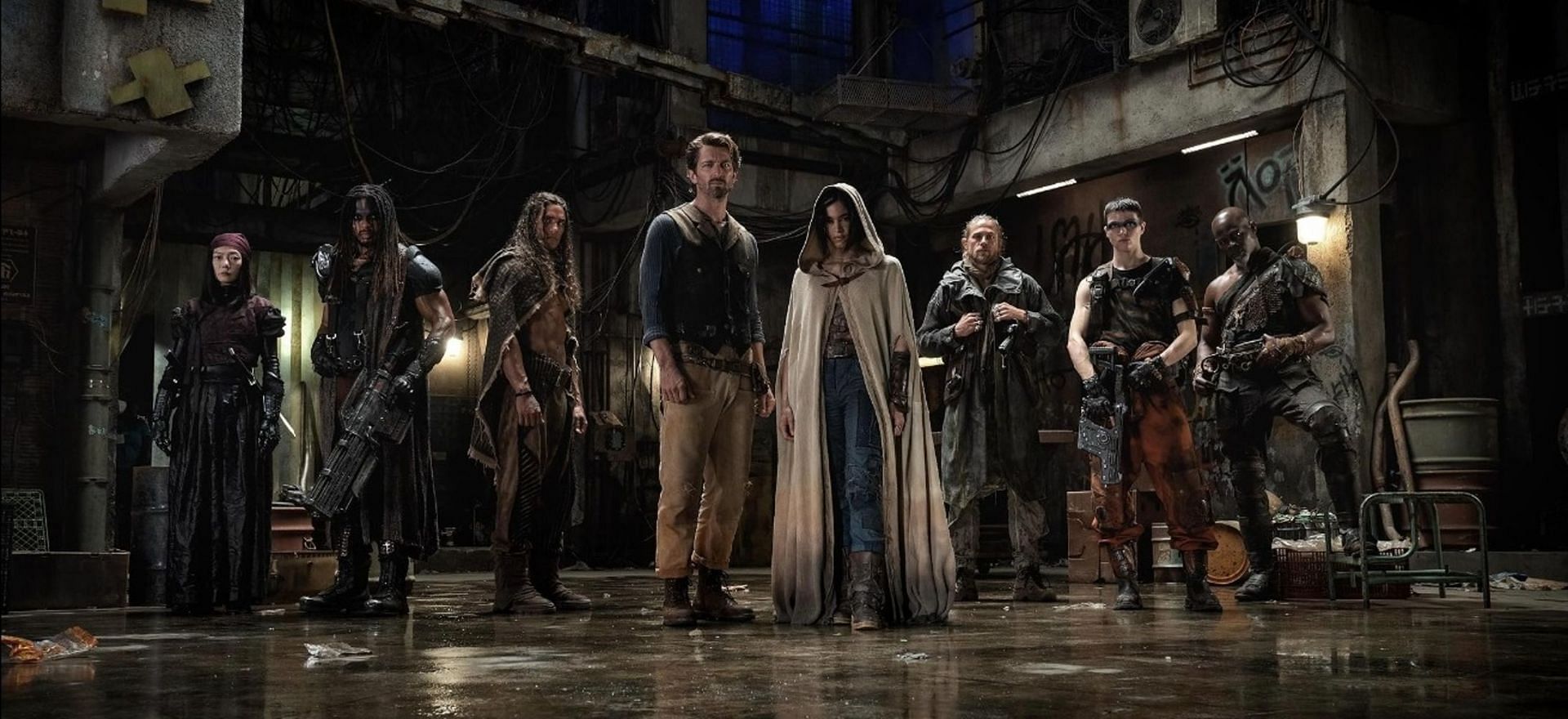 Djimon Hounsou, Bae Doona, Michiel Huisman, Charlie Hunnam, E. Duffy, Sofia Boutella, Clay Enos, Ray Fisher, and Staz Nair in a scene from Rebel Moon - Part One: A Child of Fire (Image via IMDb)