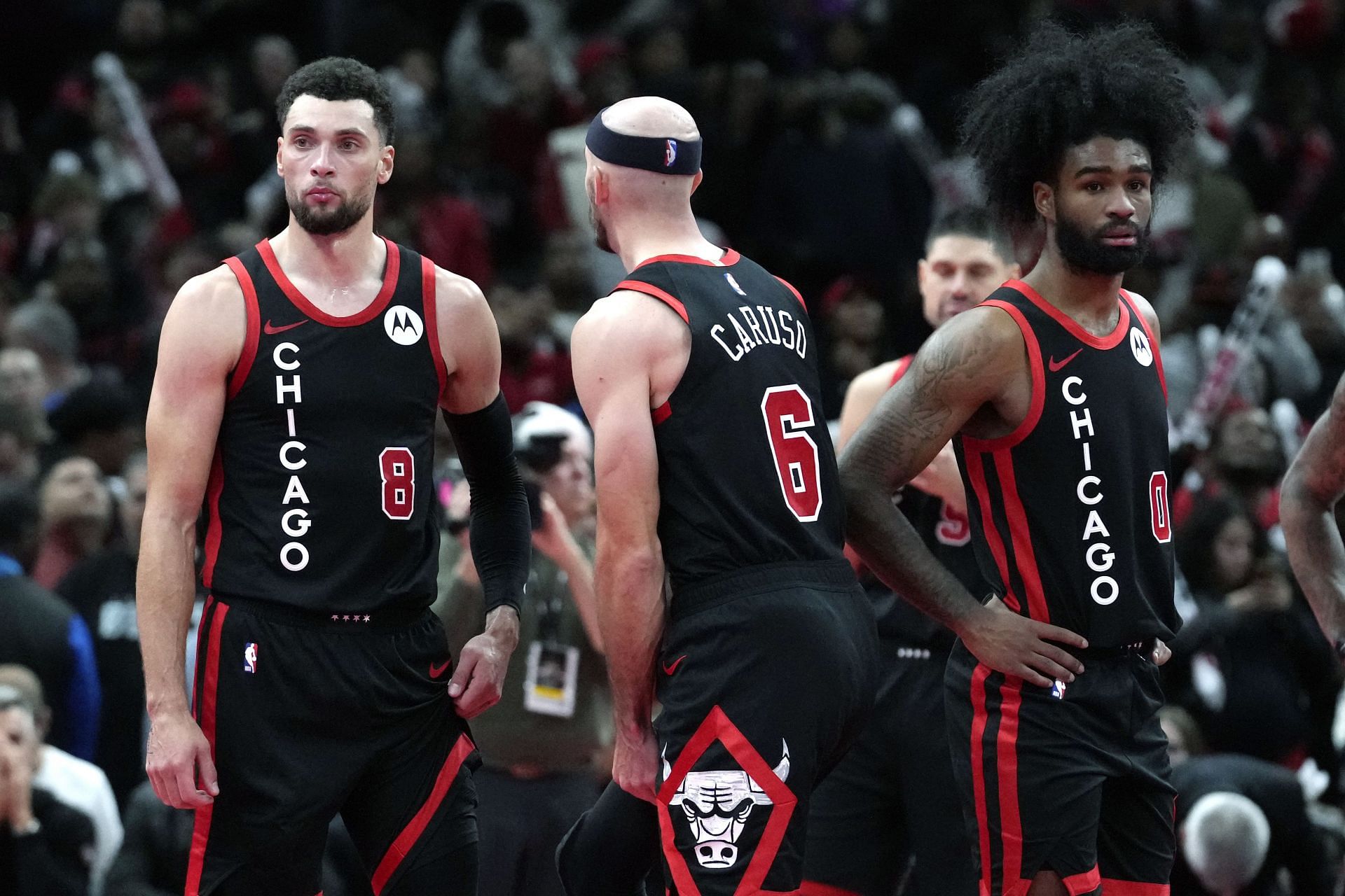 The Chicago Bulls with Zach LaVine, Alex Caruso and Coby White (L-R)