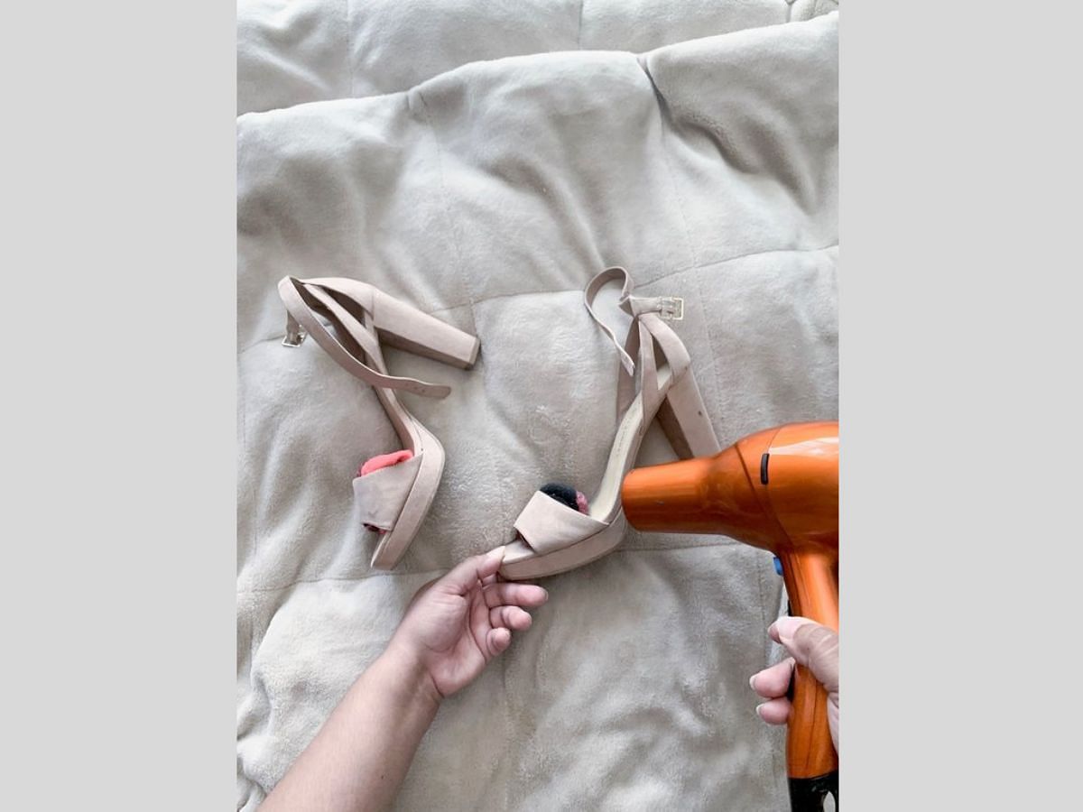 Use Hair Dryer to stretch out footwear ( Image via Quora)