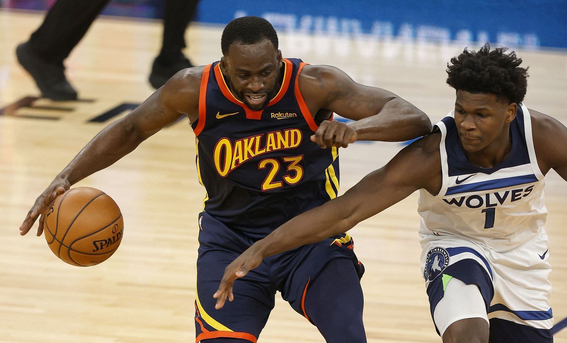 Draymond Green of the Golden State Warriors and Anthony Edwards of the Minnesota Timberwolves