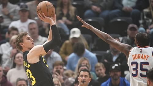 Lauri Markkanen of the Utah Jazz and Kevin Durant of the Phoenix Suns.