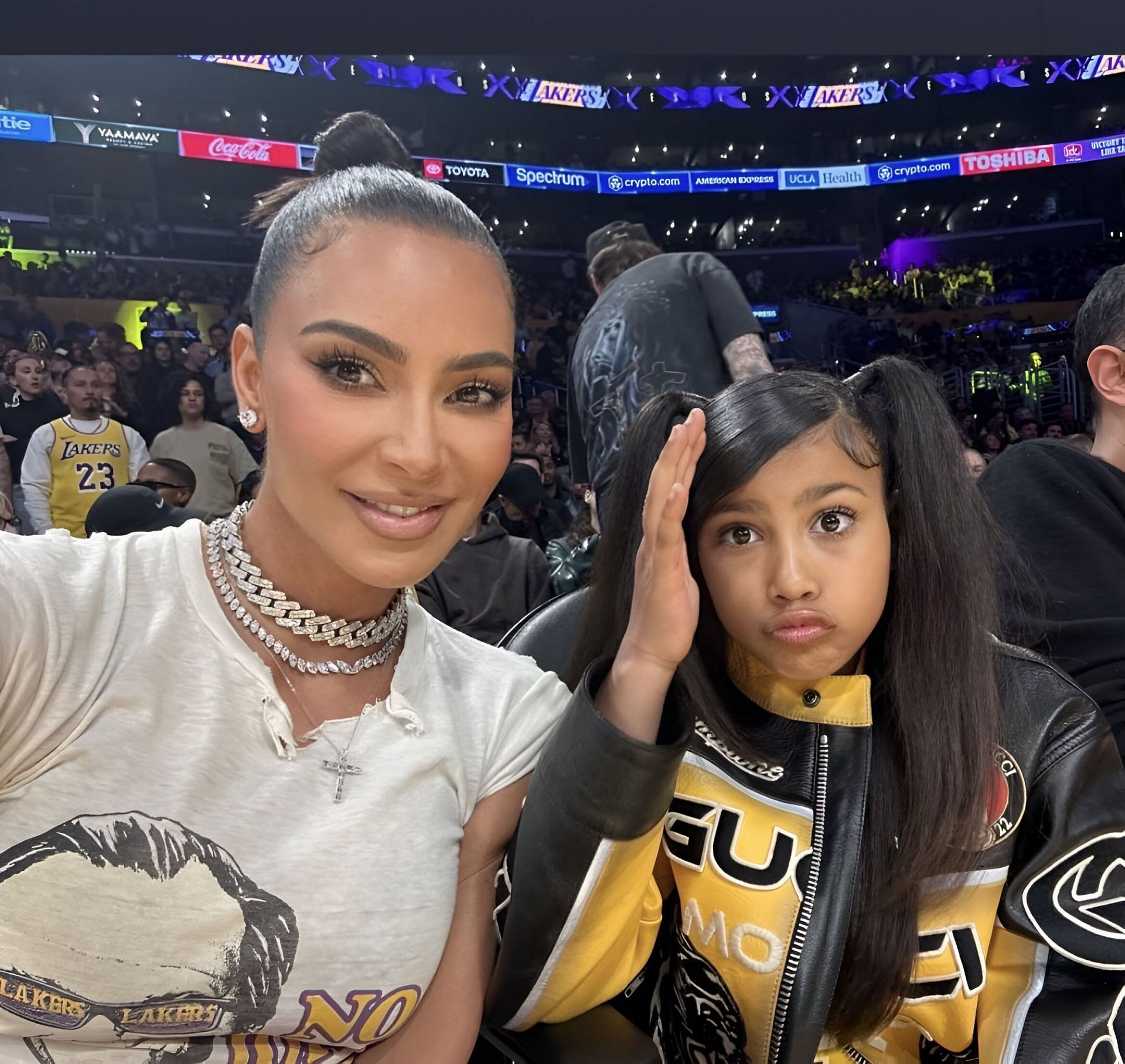 The internet has hilarious reactions to North West munching on an onion (image via @AllForKimK on X)