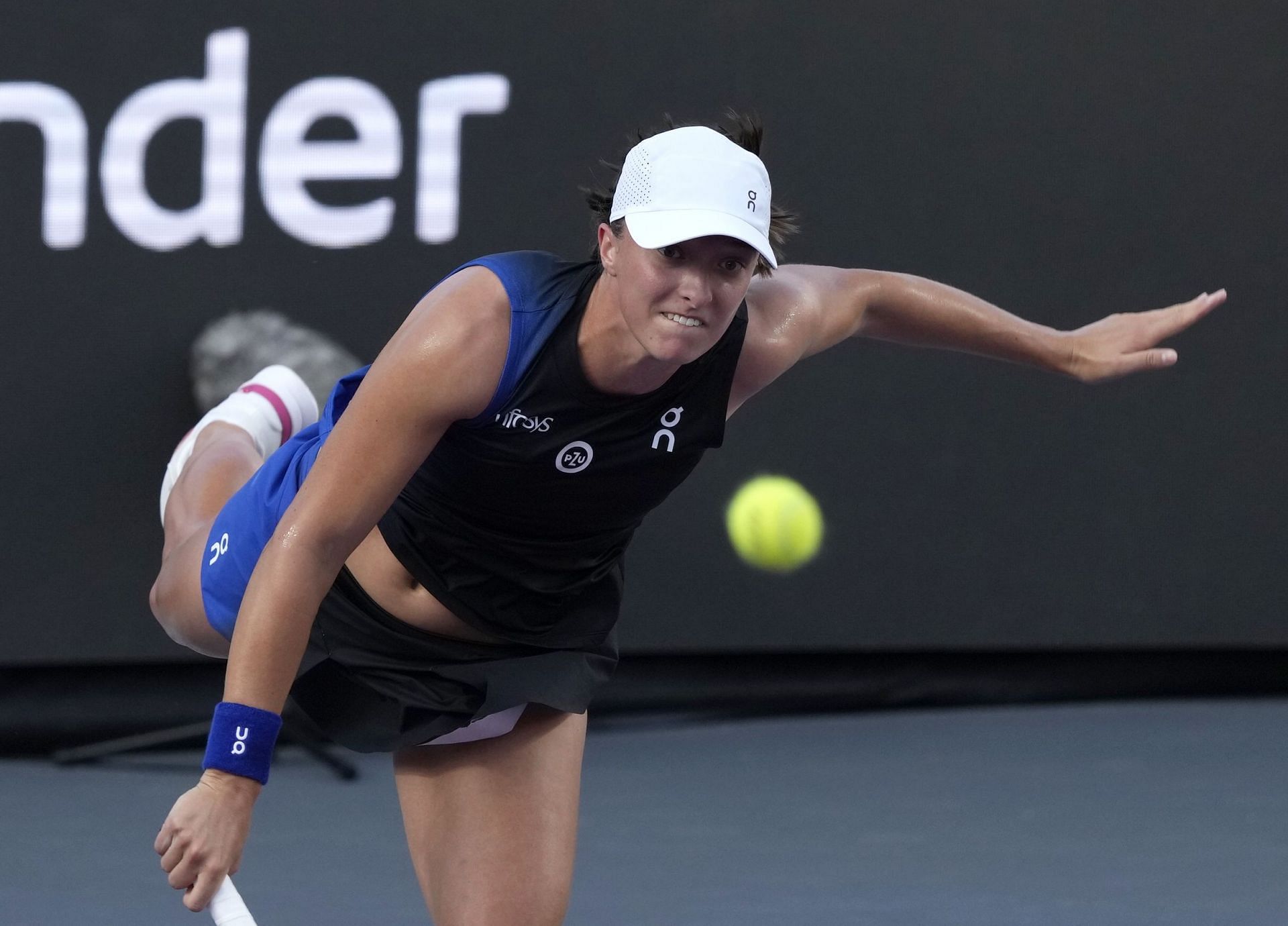 Iga Swiatek in action at the WTA Finals