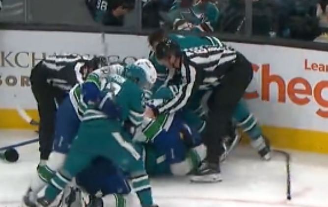VIDEO: Chaos ensues as every Vancouver Canucks and San Jose Sharks player on ice get into massive brawl