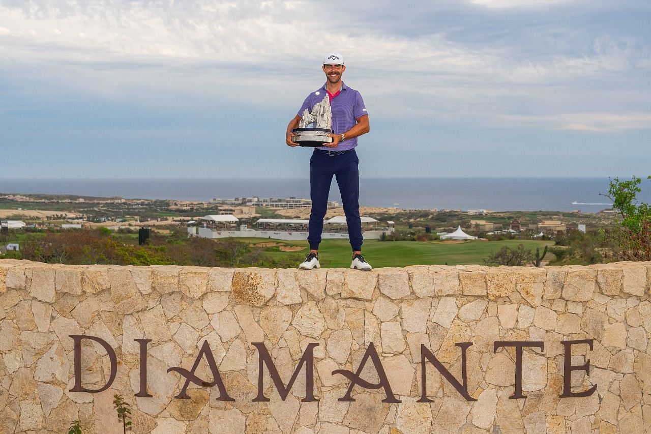 Erik van Rooyen poses with the World Wide Technology Championship trophy(Image via Twitter.com/WWTChampionship)