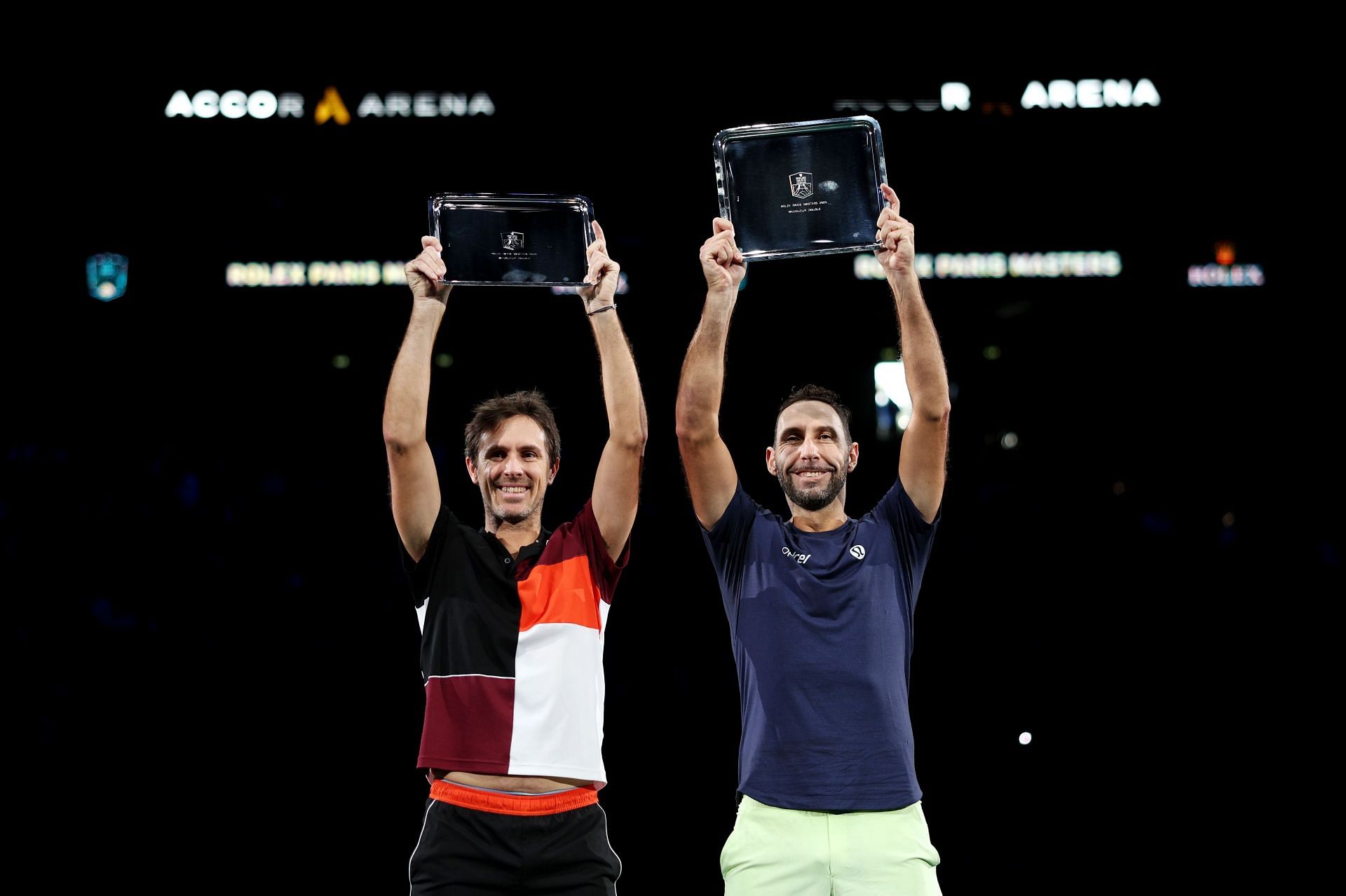 Edouard Roger-Vasselin and Santiago Gonzalez with the men&#039;s doubles trophy