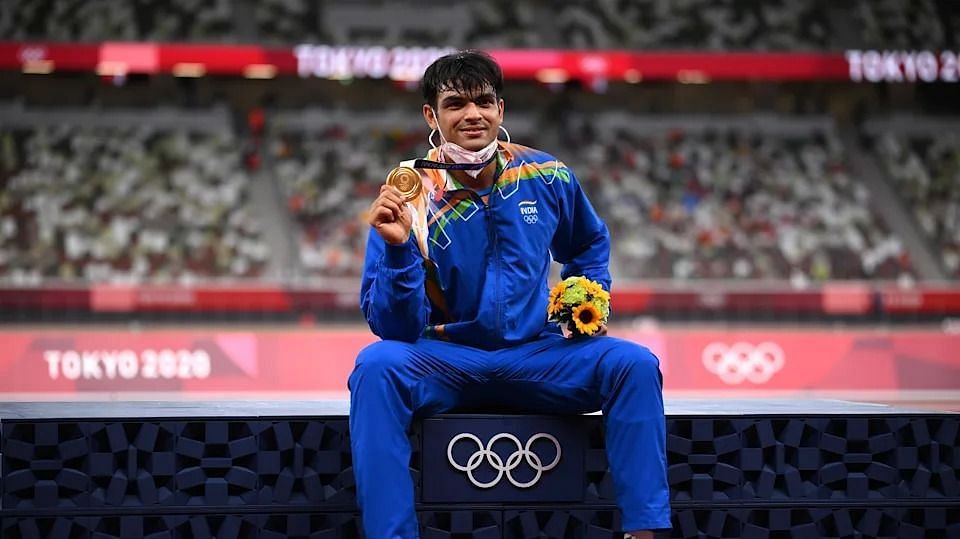 Neeraj Chopra poses for a photo with his gold medal at the Tokyo Olympics (Image Courtesy: Olympics.com)