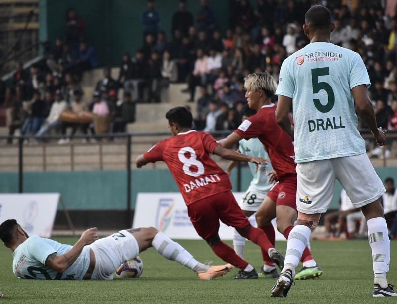 Players of Sreenidi Deccan and Shillong Lajong battling for the ball (Picture credits: X/I-League)