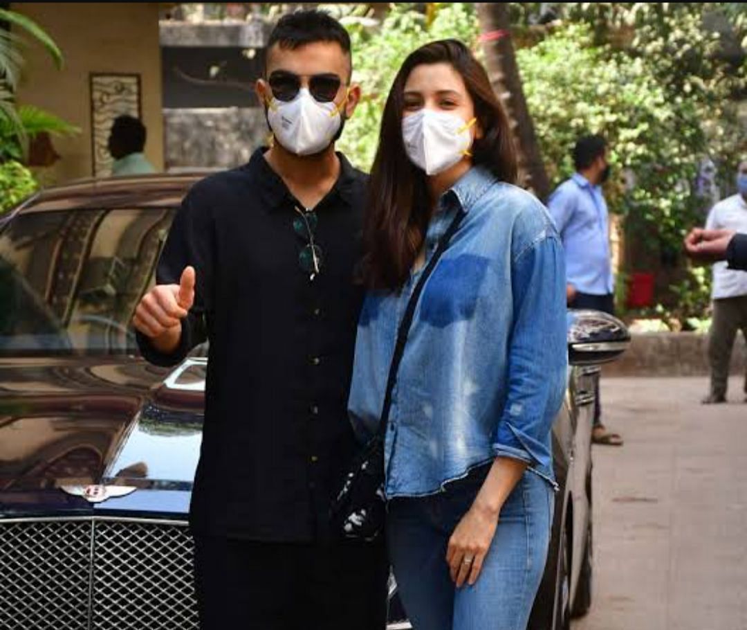 Virat Kohli and Anushka Sharma in front of the Bentley car [Getty Images]