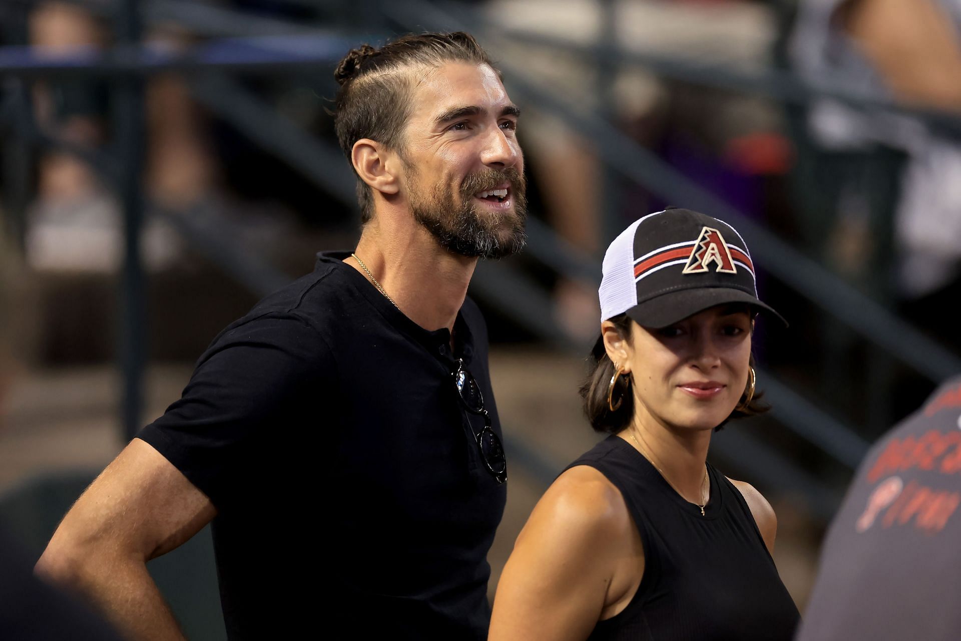 Michael Phelps is seen before Game Four of the National League Championship Series between the Arizona Diamondbacks and the Philadelphia Phillies at Chase Field in Phoenix, Arizona.