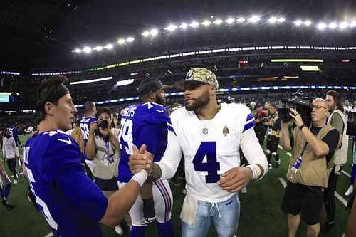 Tommy DeVito (left) at New York Giants v Dallas Cowboys