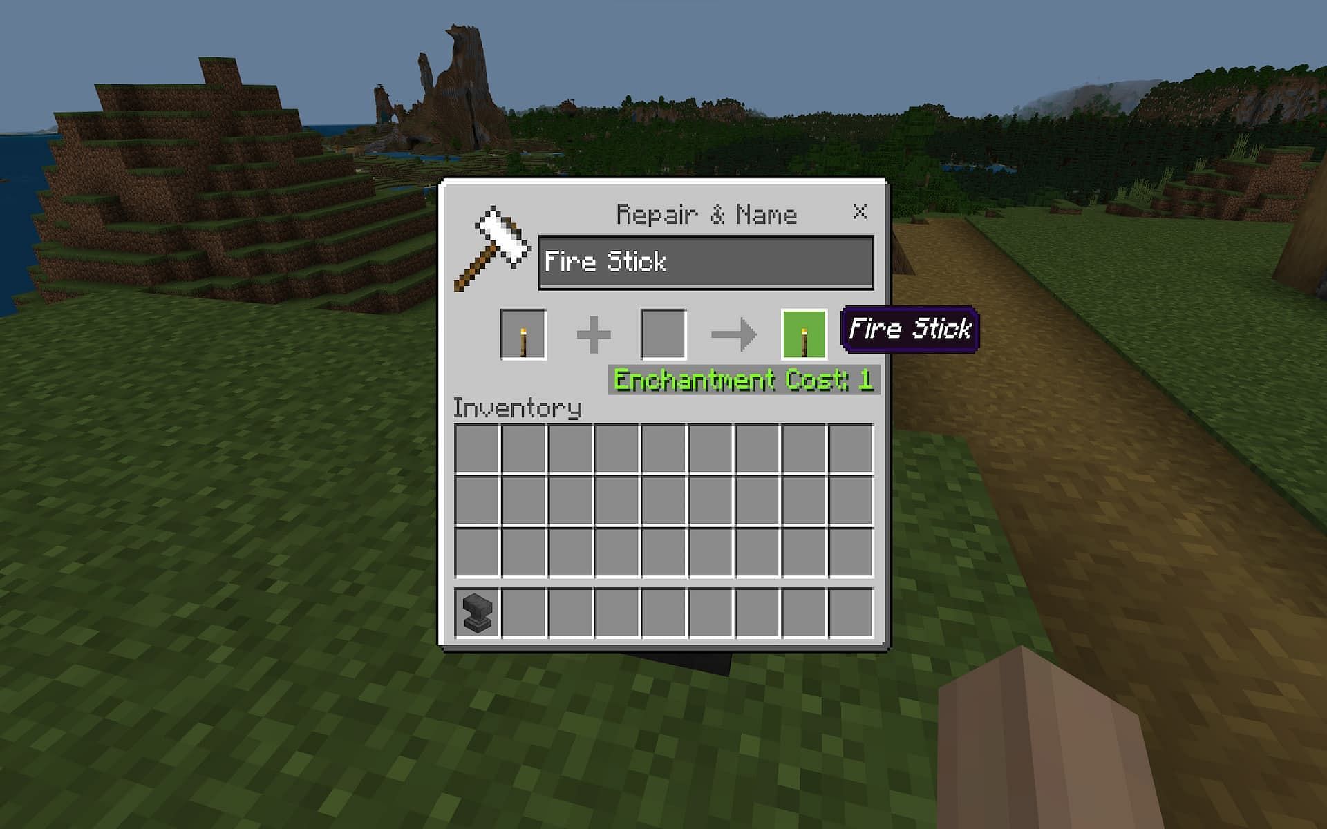 An anvil renaming a torch to fire stick in Minecraft