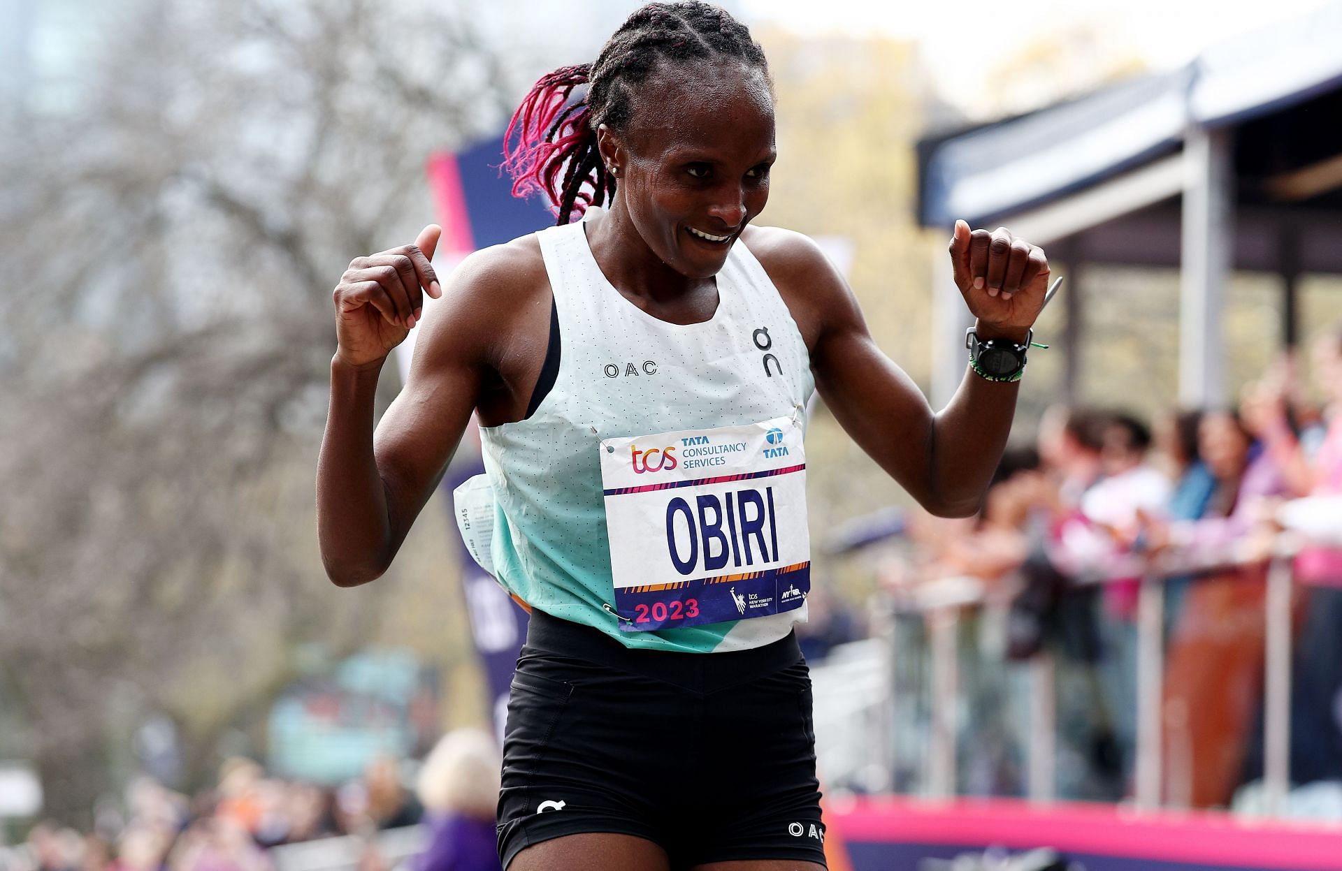 Hellen Obiri of Kenya reacts as she crosses the finish line to win the Women&#039;s Division of the 2023 TCS New York City Marathon in Central Park in New York City.