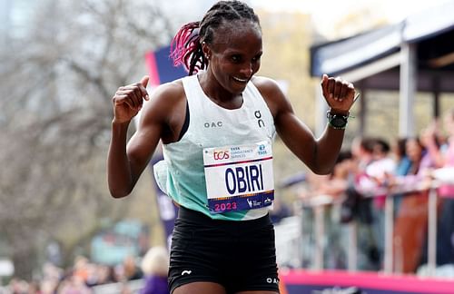 Hellen Obiri of Kenya reacts as she crosses the finish line to win the Women's Division of the 2023 TCS New York City Marathon in Central Park in New York City.