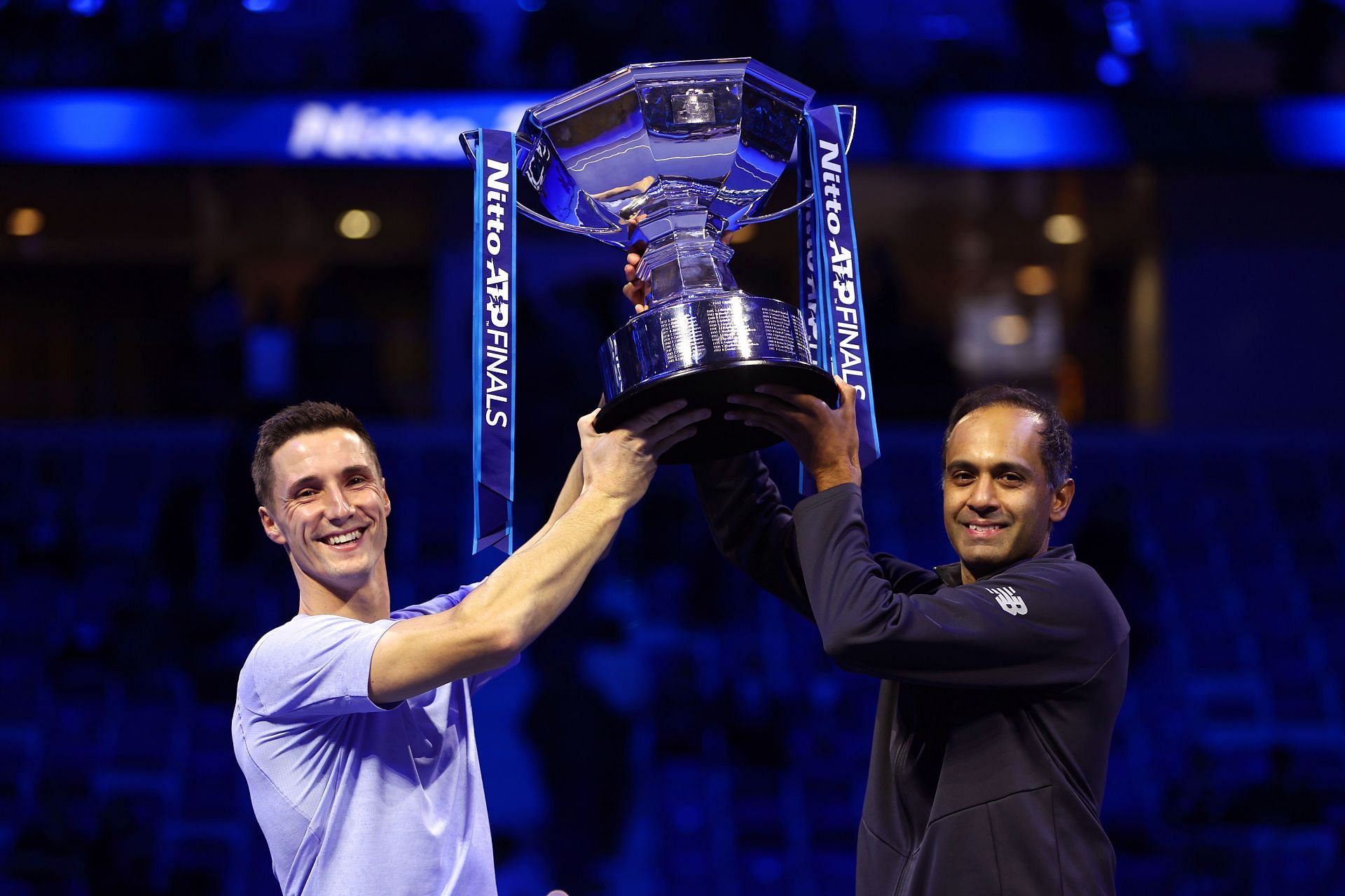 Rajeev Ram and Joe Salisbury with the Nitto ATP Finals doubles trophy.