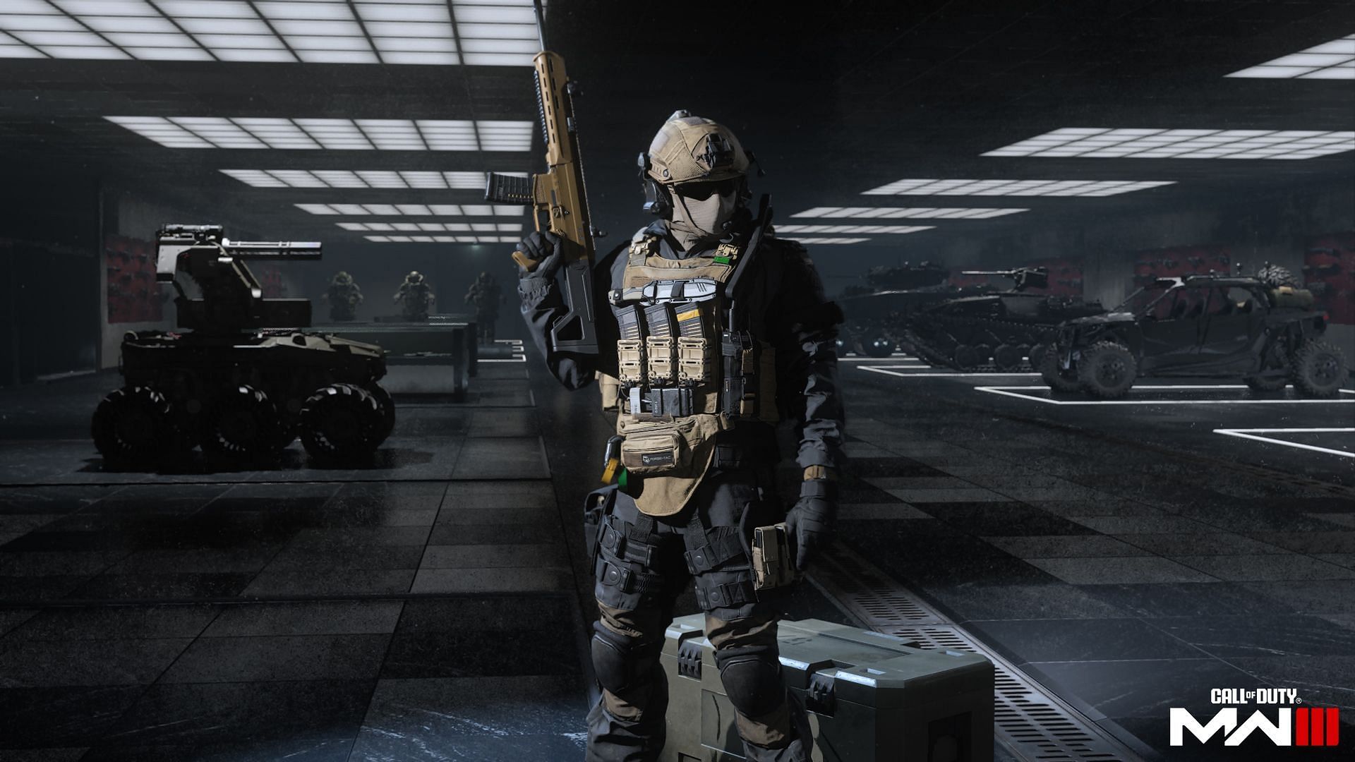 An Operator holding a rifle inside a closed hangar 